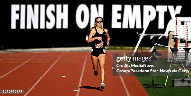 Arcadia, CA Ashlee Gallegos of JSerra runs the final leg and wins the 4x800 meter relay Invitational during the Arcadia Invitational at Arcadia High...