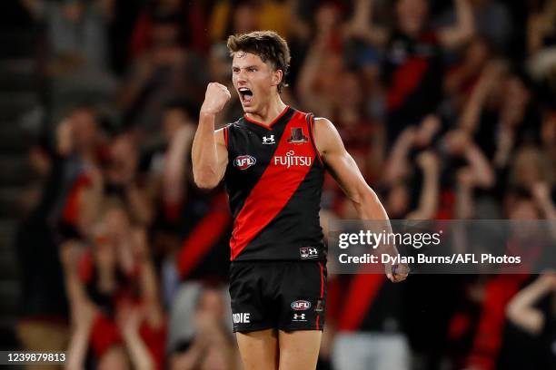 Archie Perkins of the Bombers celebrates a goal during the 2022 AFL Round 04 match between the Essendon Bombers and the Adelaide Crows at Marvel...