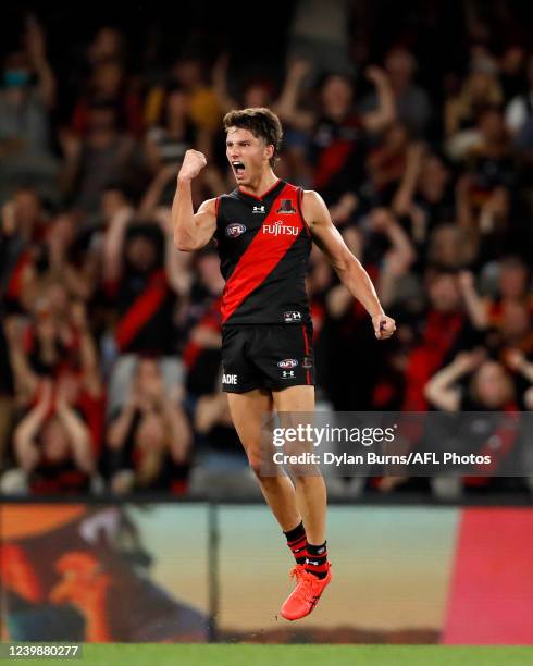 Archie Perkins of the Bombers celebrates a goal during the 2022 AFL Round 04 match between the Essendon Bombers and the Adelaide Crows at Marvel...