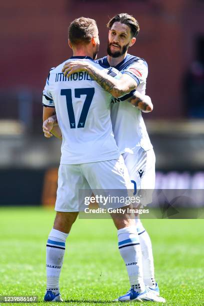 Ciro Immobile of Lazio celebrates with his team-mate Luis Alberto after scoring a goal during the Serie A match between Genoa CFC and SS Lazio at...