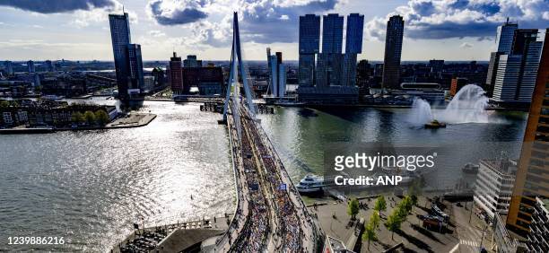 Participants will cross the erasmus bridge during the 41st edition of the NN Marathon Rotterdam on April 10, 2022 in Rotterdam, the Netherlands. ANP...