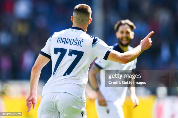 Adam Marusic of Lazio celebrates with his team-mate Luis Alberto after scoring a goal during the Serie A match between Genoa CFC and SS Lazio at...