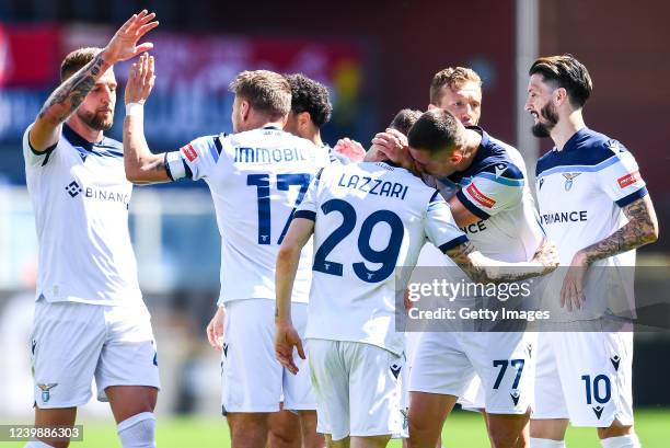 Ciro Immobile of Lazio celebrates with his team-mates after scoring a goal during the Serie A match between Genoa CFC and SS Lazio at Stadio Luigi...