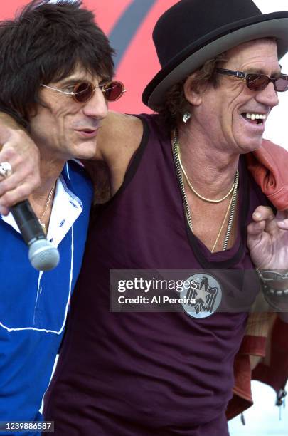 Ron Wood and Keith Richards of The Rolling Stones perform during a press conference to announce "The Bigger Bang" world tour at the Julliard Music...