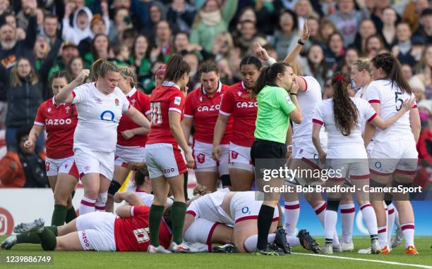 England players celebrate scoring during the TikTok Women's Six Nations match between England and Wales at Kingsholm Stadium on April 9, 2022 in...