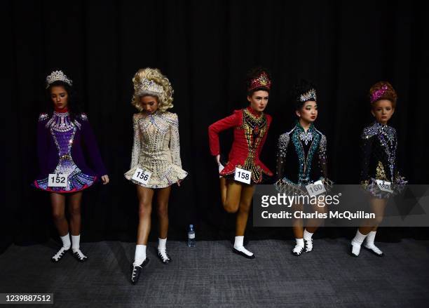 Dancers wait to be called to the stage during the opening day of the World Irish Dancing Championships at the Waterfront Hall on April 10, 2022 in...