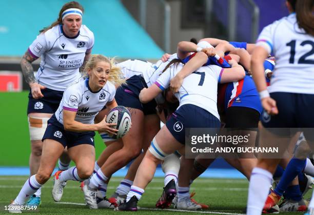 Scotland's scrum-half Jenny Maxwell carries the ball during the Six Nations international women's rugby union match between Scotland and France at...