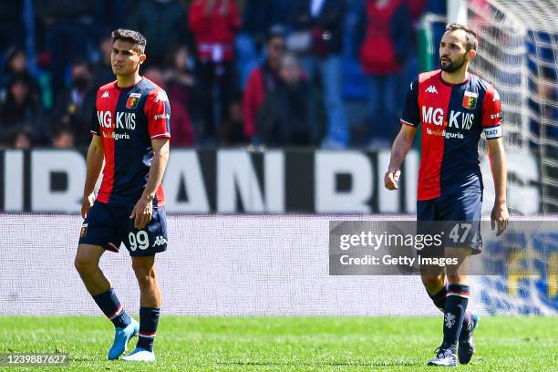 Pablo Galdames and Milan Badelj of Genoa react with disappointment after Ciro Immobile of Lazio has scored his second goal during the Serie A match...