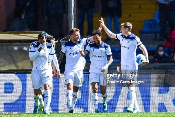 Ciro Immobile of Lazio celebrates with hgis team-mates after scoring his third goal during the Serie A match between Genoa CFC and SS Lazio at Stadio...