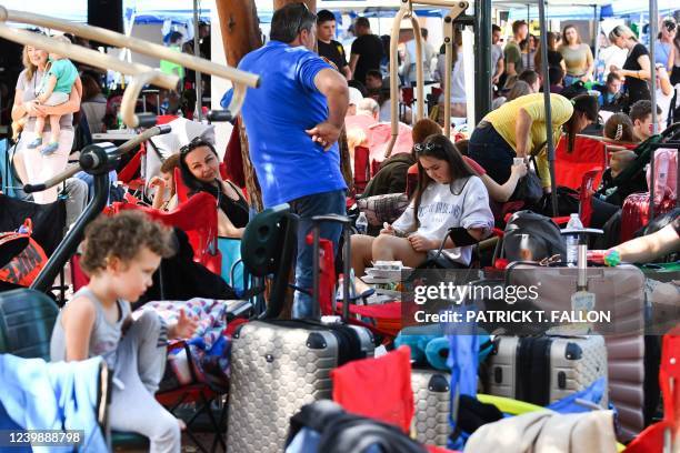 Refugees fleeing the war in Ukraine await processing of their applications at the Unidad Deportiva Benito Juárez along the border with the United...