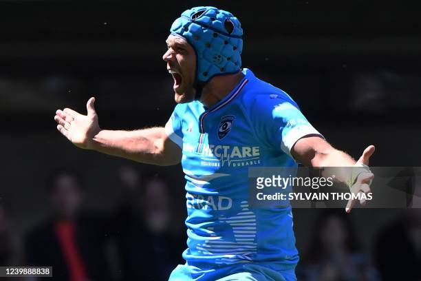 Montpellier's French flanker Zach Mercer celebrates after scoring a try during the European Rugby Champions Cup match between Montpellier and...