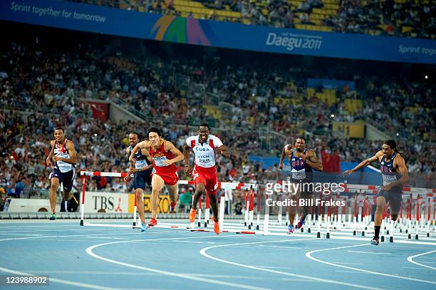 13th IAAF World Championships in Athletics: USA Jason Richardson, China Xiang Liu, and Cuba Dayron Robles in action during Men's 110M Hurdles Final...