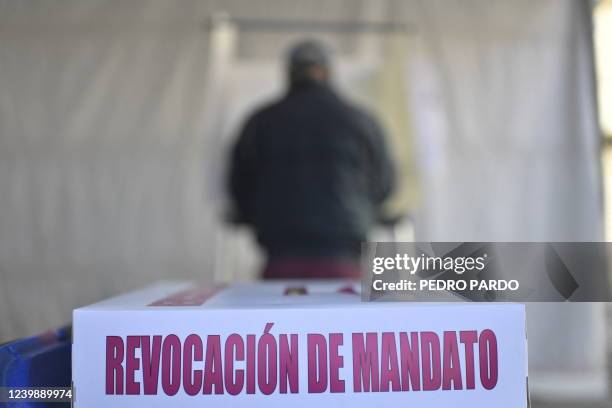 Man votes at a polling station during a national referendum on the revocation of the mandate of Mexican President Andres Manuel Lopez Obrador, in...