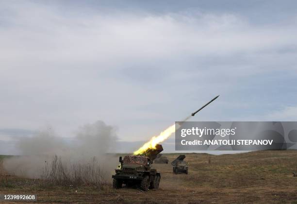 Ukrainian multiple rocket launcher BM-21 "Grad" shells Russian troops' position, near Lugansk, in the Donbas region, on April 10, 2022.