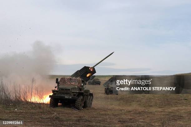 Ukrainian multiple rocket launcher BM-21 "Grad" shells Russian troops' position, near Lugansk, in the Donbas region, on April 10, 2022.