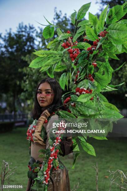 Indigenous woman Luana Melgueiro da Silva, of the Baré tribe, poses for a photo during a fashion event in Manaus, Amazonas state, Brazil, on April 9,...