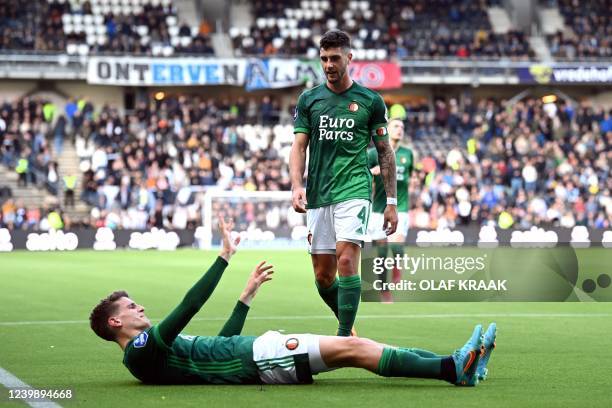 Feyenoord's Dutch midfielder Guus Til celebrates after scoring his team's third goal past Feyenoord's Argentine defender Marcos Senesi during the...