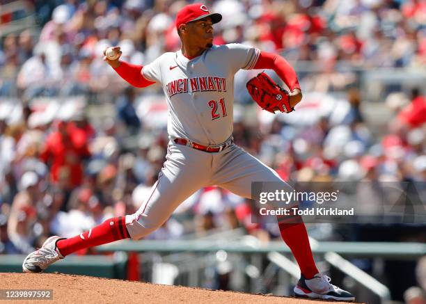 Hunter Greene of the Cincinnati Reds pitches during the first inning of his MLB debut against the Atlanta Braves at Truist Park on April 10, 2022 in...