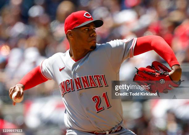 Hunter Greene of the Cincinnati Reds pitches during the first inning of his MLB debut against the Atlanta Braves at Truist Park on April 10, 2022 in...