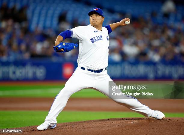 Hyun Jin Ryu of the Toronto Blue Jays delivers a pitch in the first inning during a MLB game against the Texas Rangers at Rogers Centre on April 10,...