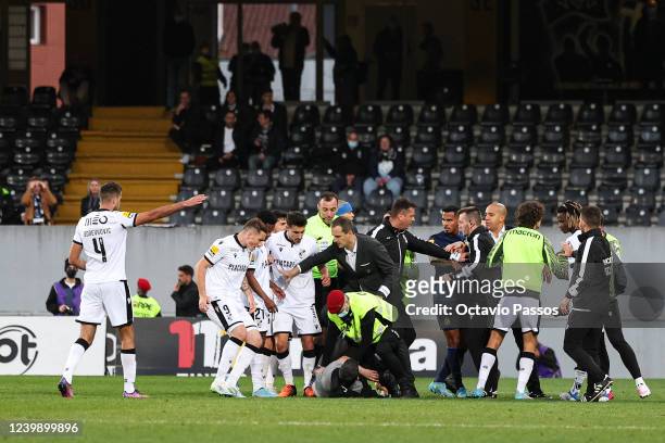 One supporter invades the pitch during the Liga Portugal Bwin match between Vitoria Guimaraes SC and FC Porto at Estadio Dom Afonso Henriques on...