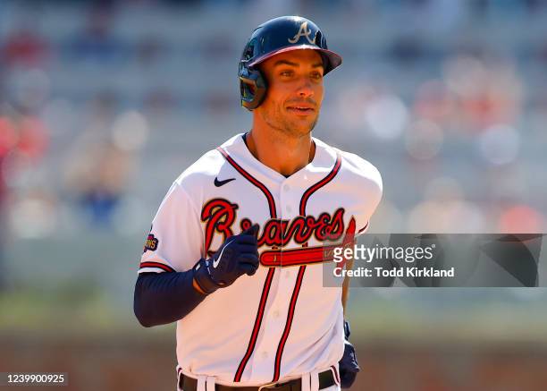 Matt Olson of the Atlanta Braves rounds second after hitting a home run during the fifth inning of an MLB game against the Cincinnati Reds at Truist...