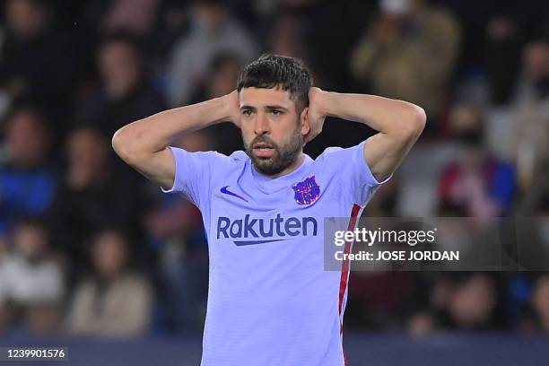 Barcelona's Spanish defender Jordi Alba reacts during the Spanish league football match between Levante UD and FC Barcelona at the Ciutat de Valencia...