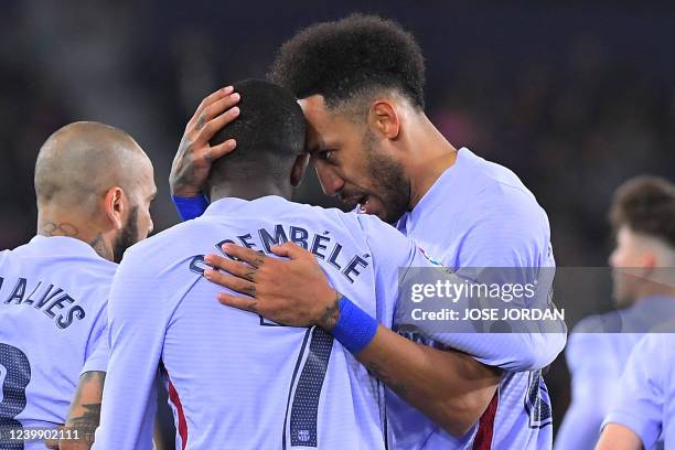 Barcelona's Gabonese midfielder Pierre-Emerick Aubameyang celebrates scoring his team's first goal during the Spanish league football match between...