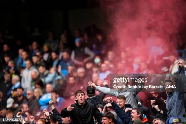 Fans of Liverpool during the Premier League match between Manchester City and Liverpool at Etihad Stadium on April 10, 2022 in Manchester, United...