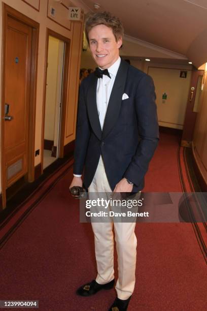 Eddie Redmayne, winner of the Best Actor in a Musical award for "Cabaret at the Kit Kat Club", poses backstage at The Olivier Awards 2022 with...