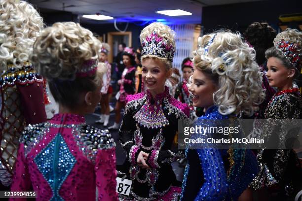 Competitors chat backstage during the opening day of the World Irish Dancing Championships at the Waterfront Hall on April 10, 2022 in Belfast,...