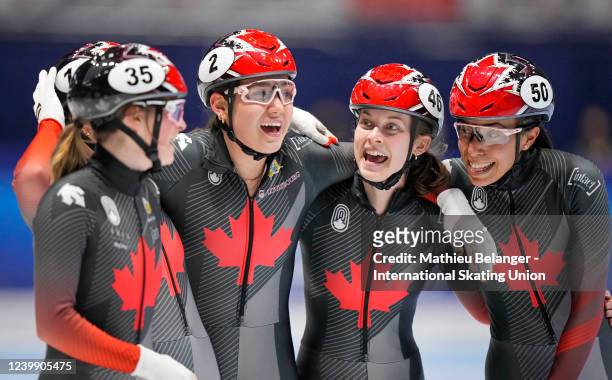 Team Canada celebrates after the 3000m relay at the World Short Track Speed Skating Championships at Maurice Richard Arena on April 10, 2022 in...