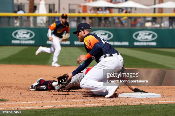 Las Vegas Aviators infielder Dalton Kelly tries to tag out Reno Aces shortstop Camden Duzenack on an attempted pick-off during a Triple-A Minor...