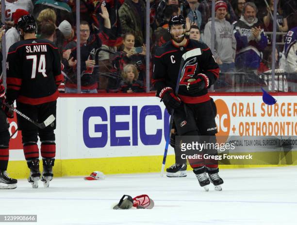Jordan Staal of the Carolina Hurricanes scores a hat trick on an empty net and skates back to the bench during an NHL game against the Anaheim Ducks...