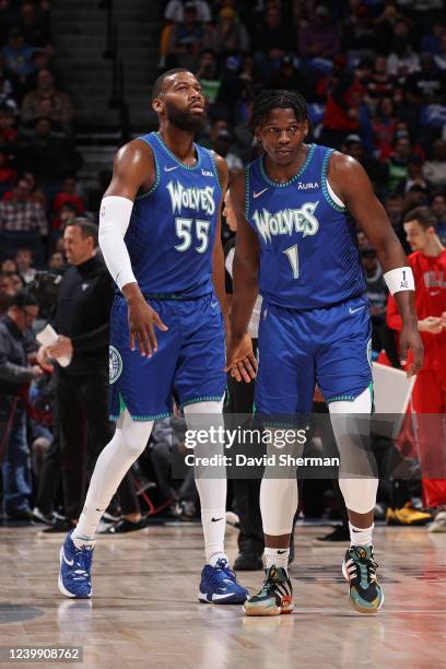 Greg Monroe of the Minnesota Timberwolves talks with Anthony Edwards of the Minnesota Timberwolves during the game against the Chicago Bulls on April...