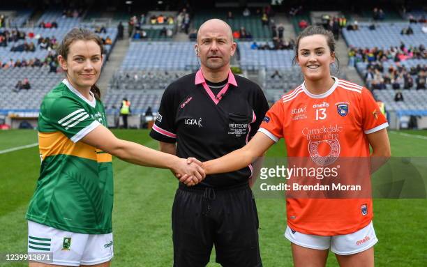 Dublin , Ireland - 10 April 2022; Team captains Anna Galvin of Kerry, left, and Aimee Mackin of Armagh shake hands in the company of referee Jonathan...