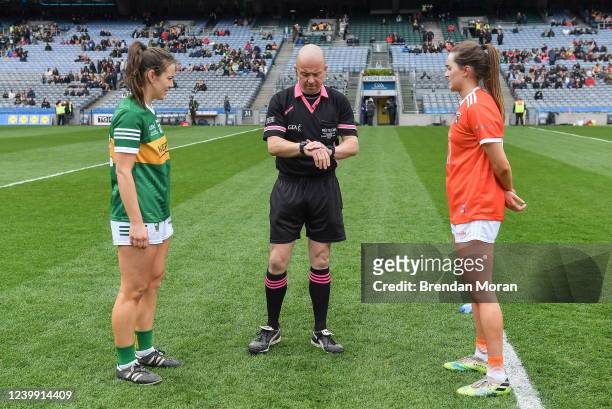 Dublin , Ireland - 10 April 2022; Referee Jonathan Murphy performs the coin toss in the company of team captains Anna Galvin of Kerry, left, and...