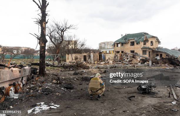 The Ukrainian military inspects the streets and broken military equipment. Bucha City in Ukraine was devastated under intense fighting and shelling...