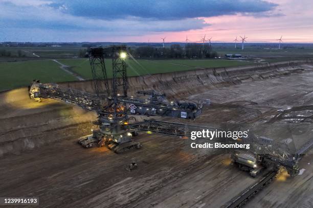Bucket-wheel excavator at the Garzweiler open-cast lignite mine, operated by RWE AG, near farmland in Grevenbroich, Germany, on Friday, April 8,...