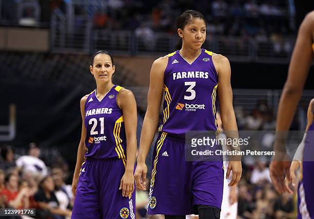 Ticha Penicheiro ande Candace Parker of the Los Angeles Sparks during the WNBA game against the Phoenix Mercury at US Airways Center on September 3,...