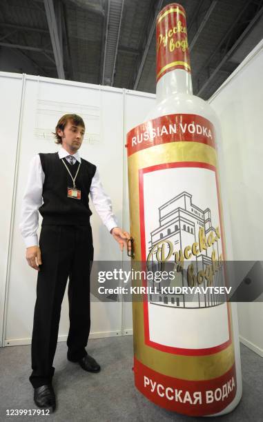 Vodka-bottle-shaped coffin made by Ghanaian born craftsman Eric Agetei Anang is displayed at 10th annual Necropolis exhibition in Moscow, on October...