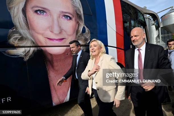 French far-right party Rassemblement National presidential candidate Marine Le Pen and her body guards, including her personal one Thierry Legier ,...