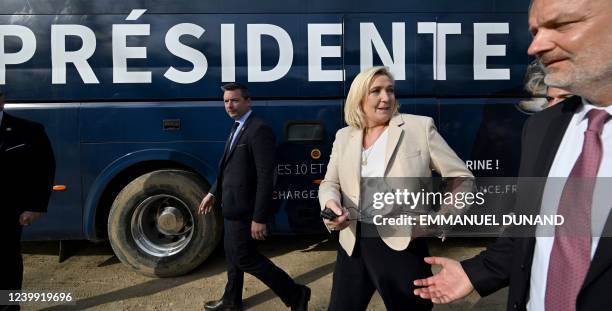 French far-right party Rassemblement National presidential candidate Marine Le Pen and her body guards, including her personal one Thierry Legier ,...