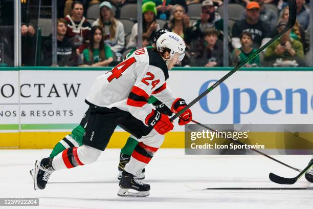 New Jersey Devils defenseman Ty Smith chases the puck during the game between the Dallas Stars and the New Jersey Devils on April 9, 2022 at the...