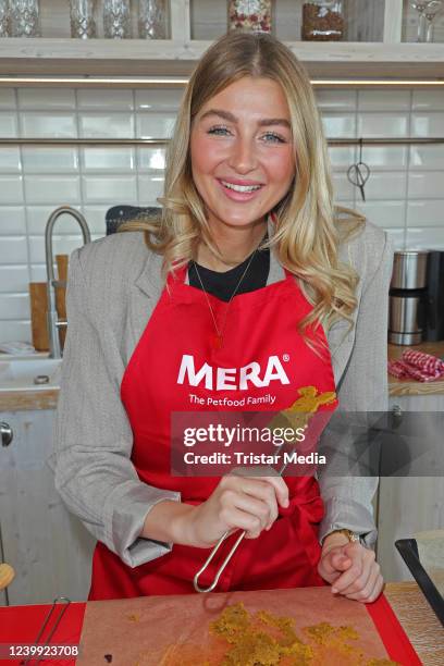 Sophie Peinemann bakes dog biscuit with Mera petfood at Sturmfreie Bude on April 11, 2022 in Hamburg, Germany.