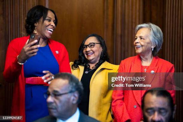 From left, Del. Stacey Plaskett, D-V.I., Reps. Nikema Williams, D-Ga., and Bonnie Watson Coleman, D-N.J., are seen in the U.S. Capitols Rayburn Room...