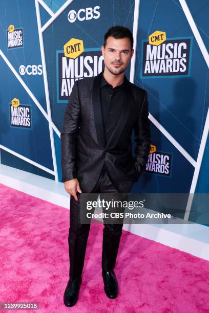 Taylor Lautner arriving at the 2022 CMT Music Awards, broadcasting LIVE from Nashville on Monday, April 11 on the CBS Television Network, and...