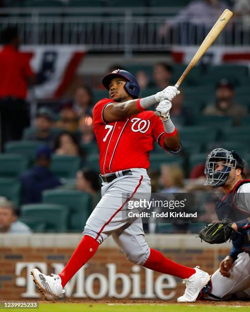 Maikel Franco of the Washington Nationals hits a two run home run during the third inning of an MLB game against the Atlanta Braves at Truist Park on...