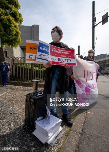 This picture taken on April 11, 2022 shows a rally held in support of Vietnamese technical intern trainee Le Thi Thuy Linh by her team of attorneys...