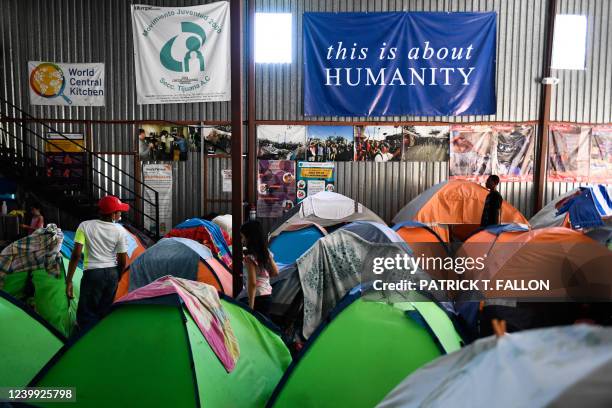 Families with children live in tents the Movimiento Juventud 2000 shelter with refugee migrants from Central and South American countries including...